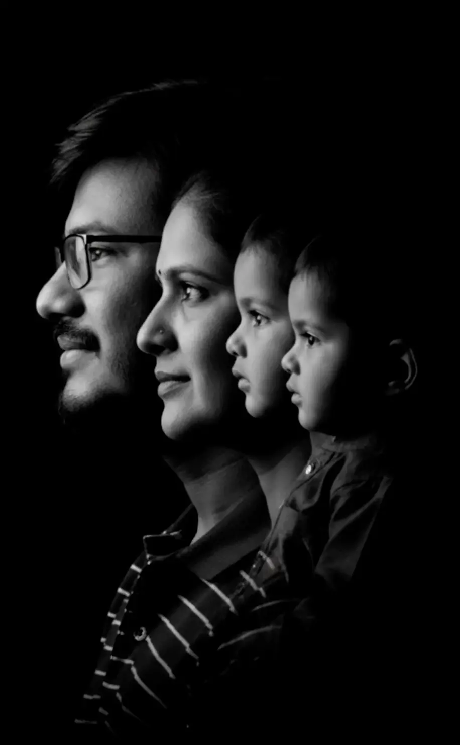 Photorealistic Fine-Art Black & White Family Portrait Nano Banana prompt example