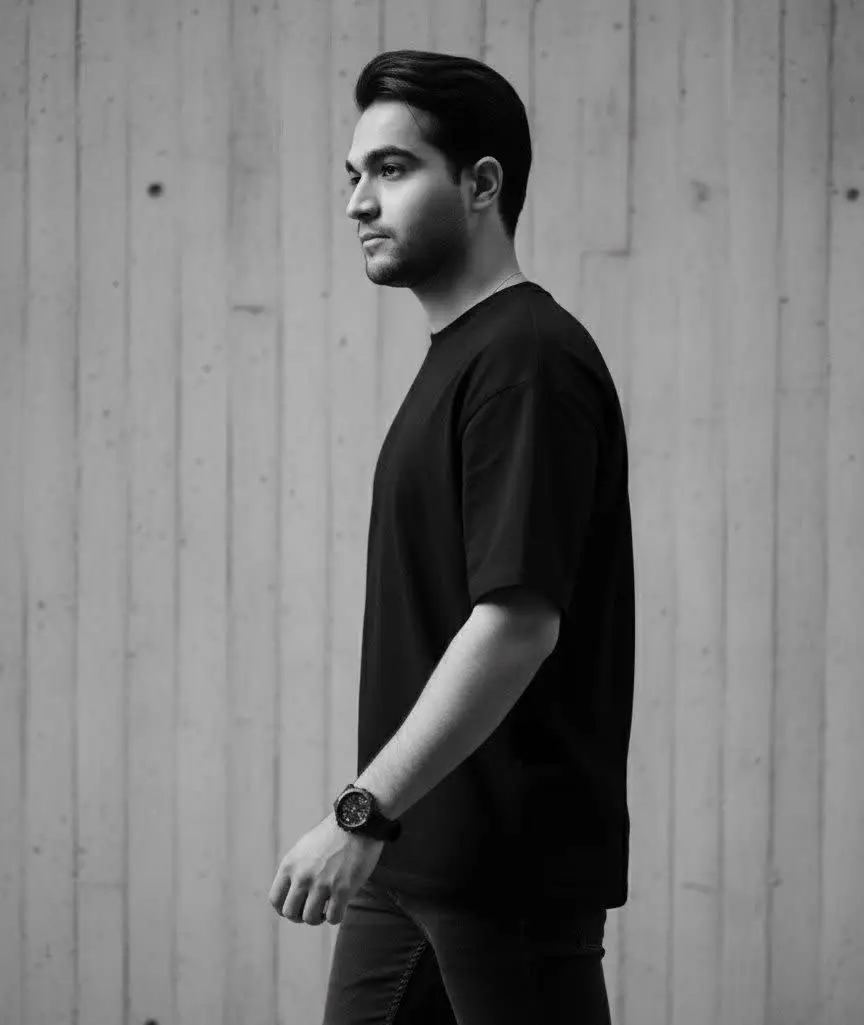 A cinematic black and white portrait of a young man Nano Banana prompt example